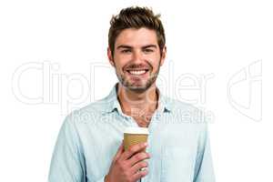 Smiling man with disposable cup