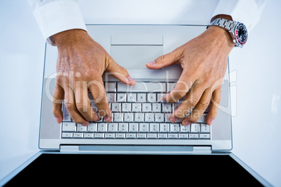 Businessman using his laptop