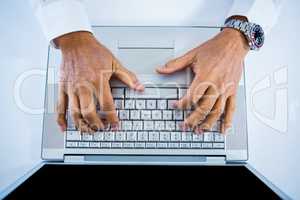 Businessman using his laptop