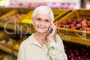 Old woman having a phone call