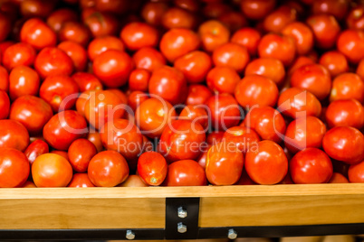 Close up view of fresh tomatoes in boxes