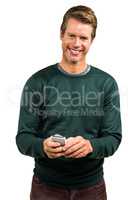 Portrait of smiling man using smartphone