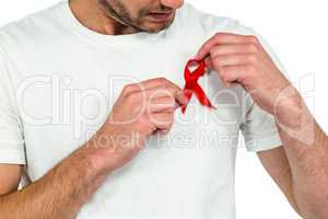 Man with red ribbon