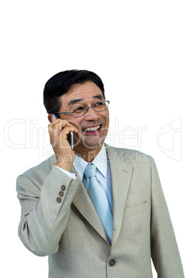 Smiling asian businessman phone calling