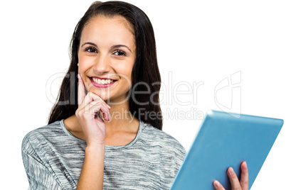 Smiling woman using tablet