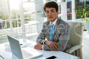 Asian businessman in his office