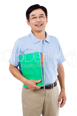 Portrait of happy businessman with files