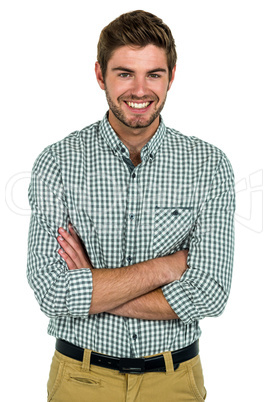 Smiling man with arms crossed