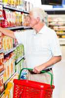 Senior man buying food