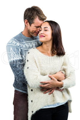 Affectionate couple in warm clothing