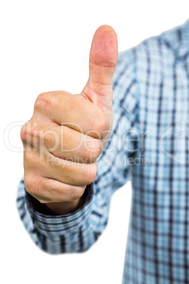 Cropped image of man showing thumbs up sign
