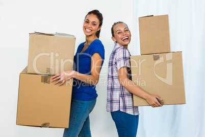 Friends holding boxes
