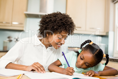 Mother checking daughters homework