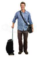 Full length of cheerful man with luggage