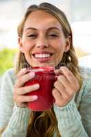 Young girl drink her coffee