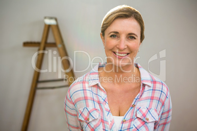 Happy woman smiling at the camera