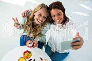 two girls take a selfie