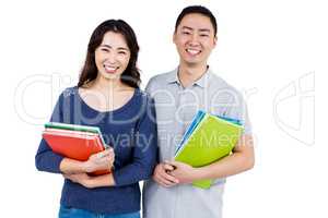 Happy couple holding books