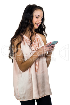 Smiling woman using smartphone