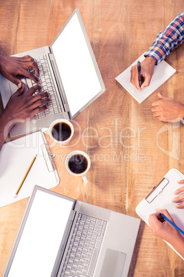 Cropped image of business people working