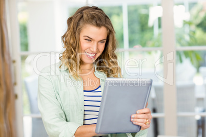 Woman using tablet computer