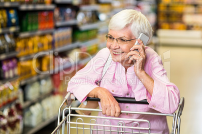 Smiling senior woman on phone