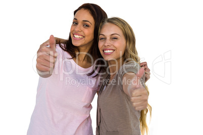 Two girls thumbs up