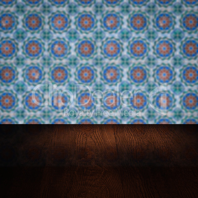 Wood table top and blur vintage ceramic tile pattern wall