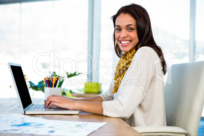 Young girl uses his computer