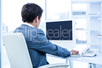 Businessman using his telephone