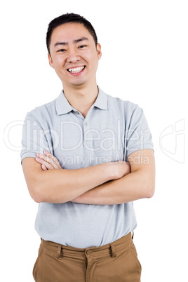 Portrait of a happy man with arms crossed