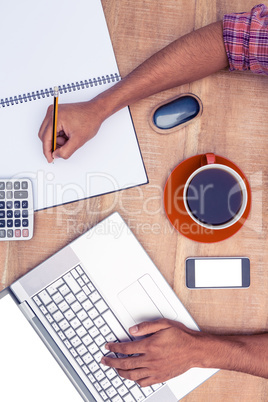 Overhead view of businessman working in office