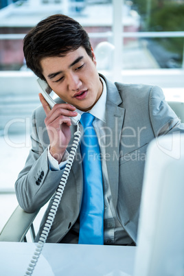 Asian businessman on the phone