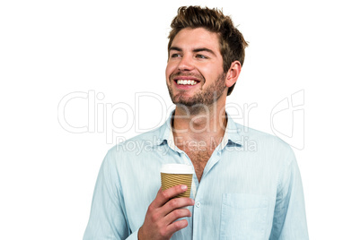 Smiling man with disposable cup Smiling man with disposable cup