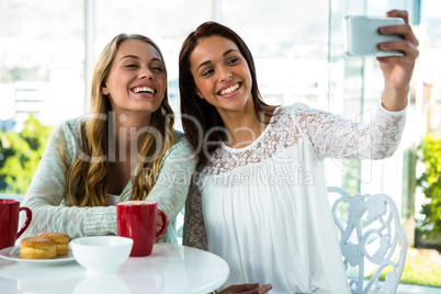 two girls take a selfie