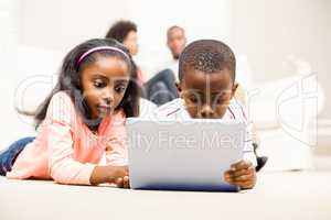 Happy kids using tablet pc