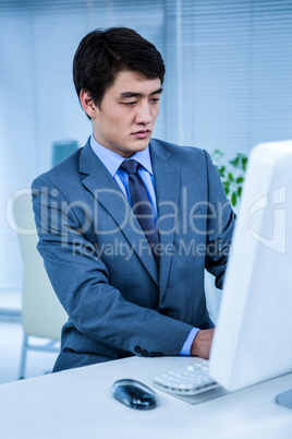 Businessman using his computer