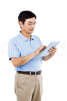 Man using digital tablet while standing