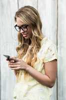 Smiling women using mobile phone