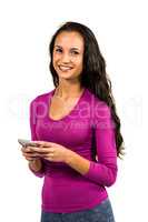 Pretty woman using smartphone and looking at the camera