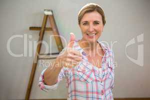 Woman with thumbs up