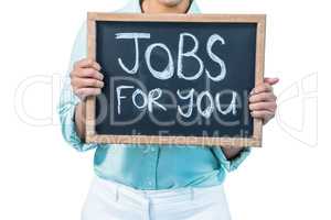 Businesswoman holding a signboard jobs for you