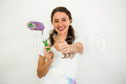 Smiling girl with thumbs up