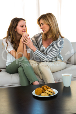 Mother comforting her daughter