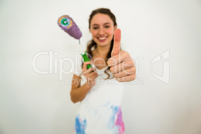 Smiling girl with thumbs up