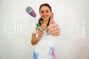 Smiling girl with thumbs up