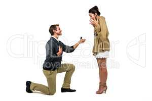 Man offering engagement ring to partner