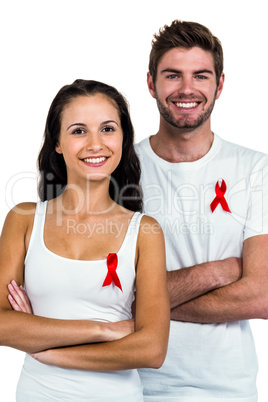 Smiling couple with red ribbon