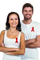 Smiling couple with red ribbon