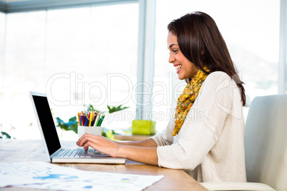 Young girl uses his computer